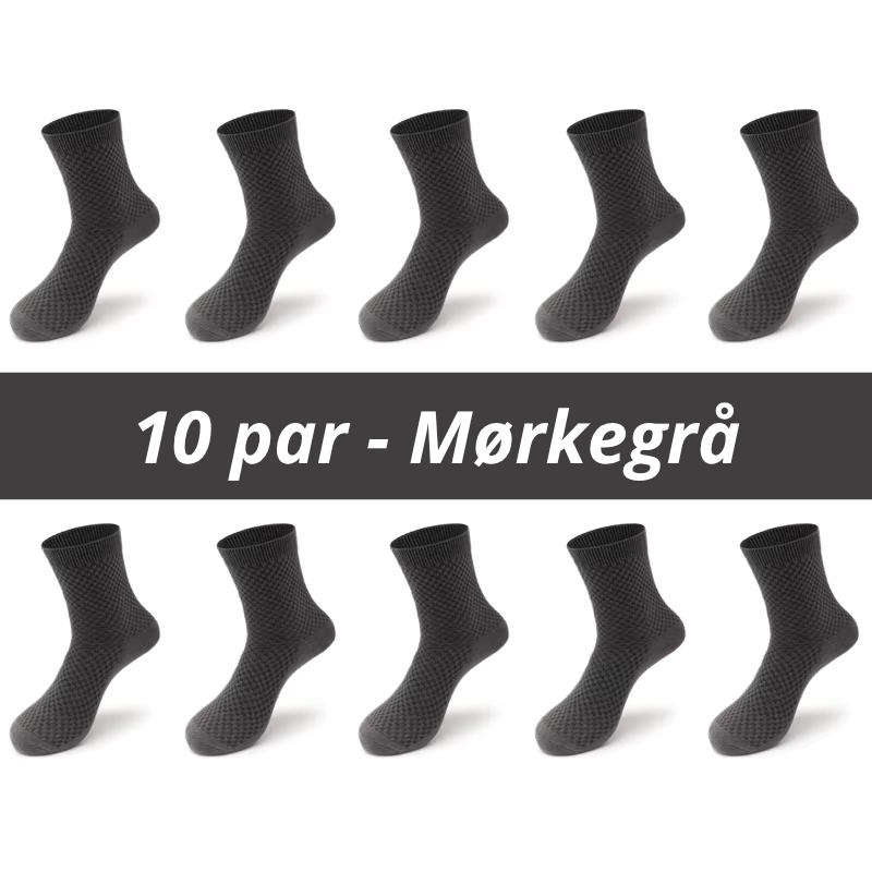 Ti mørkegrå bambusstrømper arrangeret i to rækker af fem med teksten "10 par - Mørkegrå" på mørkt banner – tydelig ternet rillestruktur på skaft med glat hælparti – klassisk mørkegrå herrestrømpe i bambusviskose str. 38-45 – Bambusstrømper til mænd | BIBAMBUS 'The Bamboo Gentleman'