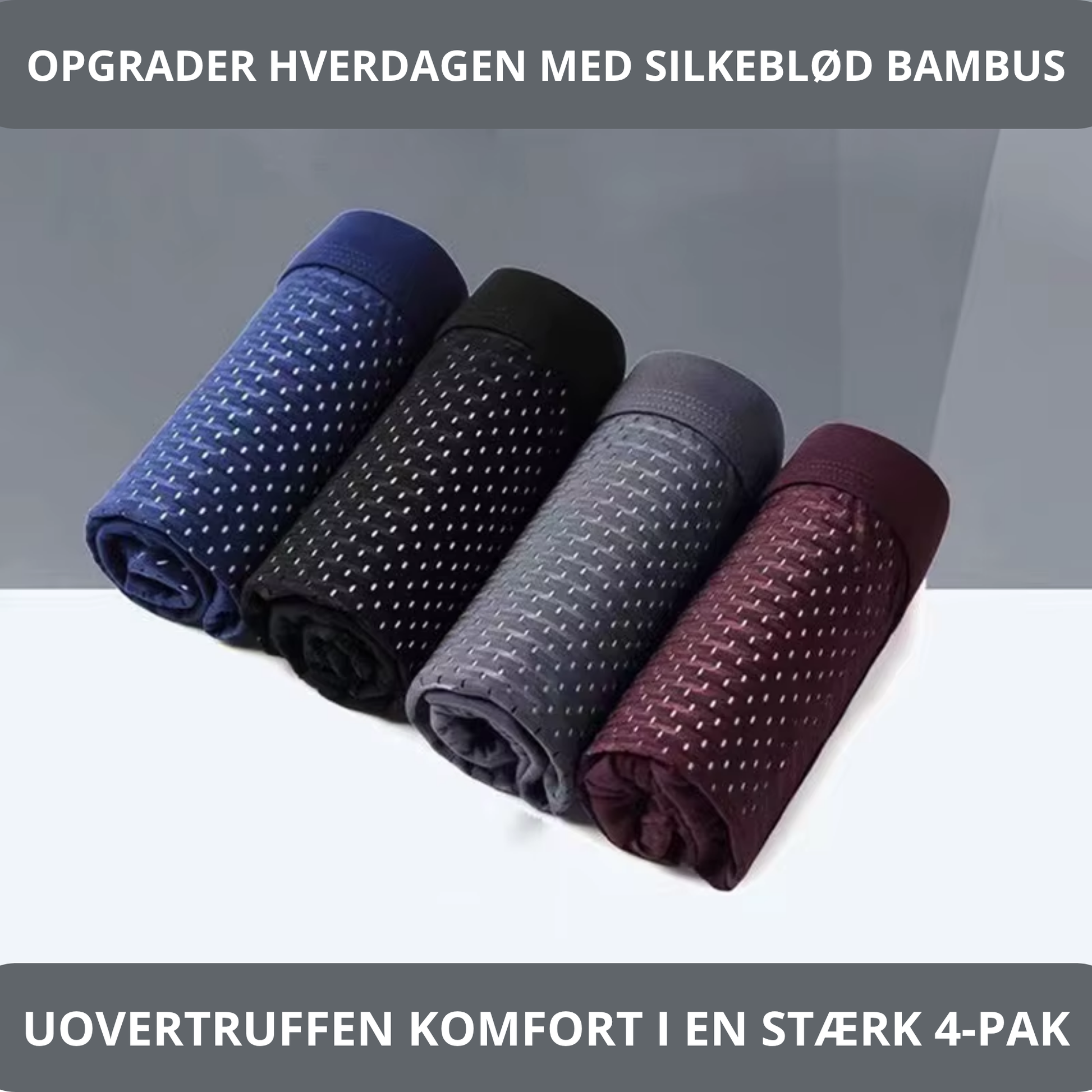 Fire oprullede bambus boksershorts i marineblå, sort, grå og vinrød med mesh-mønster og teksten "OPGRADER HVERDAGEN MED SILKEBLØD BAMBUS – UOVERTRUFFEN KOMFORT I EN STÆRK 4-PAK" – blødt åndbart herreundertøj i bambusviskose – Bambus Underbukser | BIBAMBUS 'My Private Bamboos'